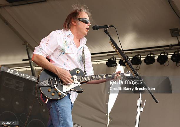 Neil Young performs during the 40th annual New Orleans Jazz & Heritage Festival at the Fair Grounds Race Course on May 3, 2009 in New Orleans.