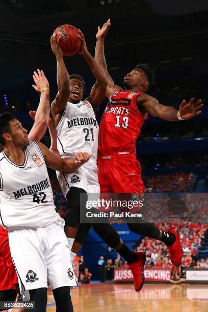 Casper Ware of United drives to the basket against Derek Cooke Jr. Of the Wildcats during the round three NBL match between the Perth Wildcats and...