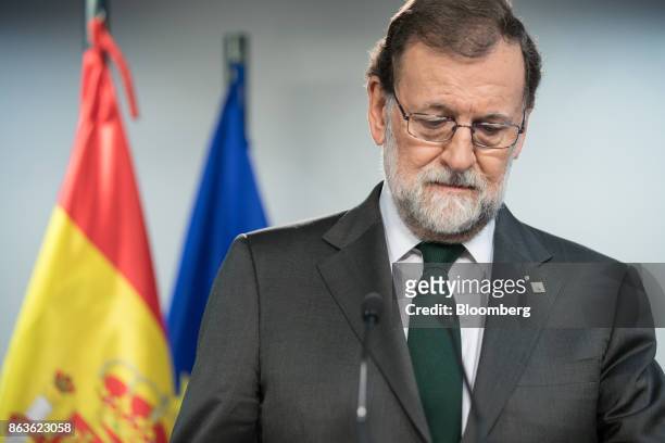 Mariano Rajoy, Spain's prime minister, pauses during a news conference at a European Union leaders summit in Brussels, Belgium, on Friday, Oct. 20,...