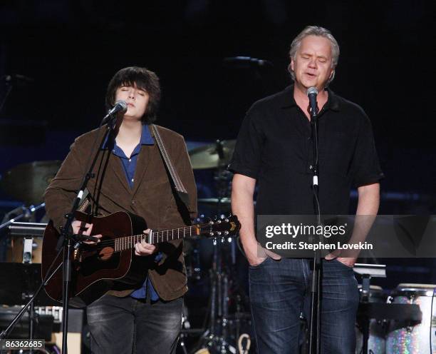 Miles Robbins and Tim Robbins perform at The Clearwater Benefit Concert celebrating Pete Seeger's 90th birthday at Madison Square Garden on May 03,...