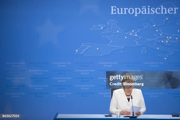 Angela Merkel, Germany's chancellor, speaks during a news conference at a European Union leaders summit in Brussels, Belgium, on Friday, Oct. 20,...