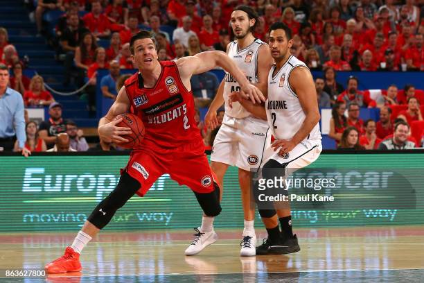 Lucas Walker of the Wildcats drives to the basket during the round three NBL match between the Perth Wildcats and Melbourne United at Perth Arena on...