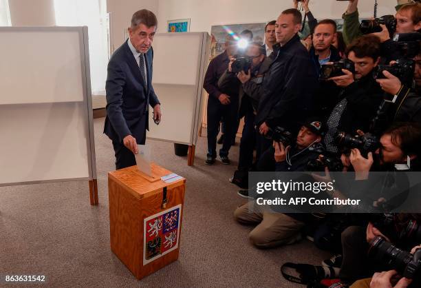 Czech billionaire Andrej Babis, chairman of the ANO movement , casts his ballot at a polling station during the first day of the Czech elections on...