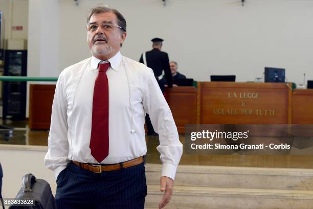 The lawer Fabio Anselmo stands near the sign 'La legge Ã¨ uguale per tutti' during the New trial against five military police officers for the death...
