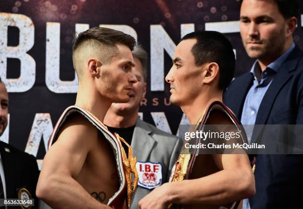 Ryan Burnett and Zhanat Zhakiyanov stare at each other during the weigh in for the Burnett v Zhakiyanov IBF and WBA Super World Bantamweight...