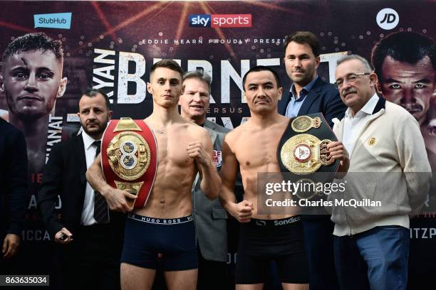 Ryan Burnett and Zhanat Zhakiyanov pose for photographers during the weigh in for the Burnett v Zhakiyanov IBF and WBA Super World Bantamweight...