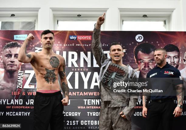 Renald Garrido of France wearing a halloween costume gestures next to Tyrone McKenna of Northern Ireland at the weigh in for the Ryan Burnett v...