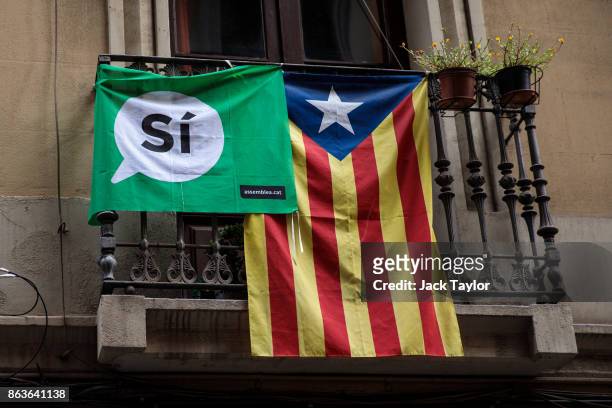 Catalan independence flags hang from a balcony on October 20, 2017 in Barcelona, Spain. The Spanish government is to take steps to suspend...