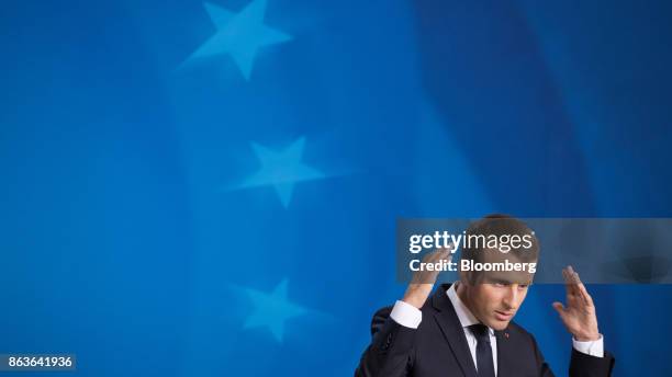 Emmanuel Macron, France's president, gestures while speaking during a news conference at a European Union leaders summit in Brussels, Belgium, on...