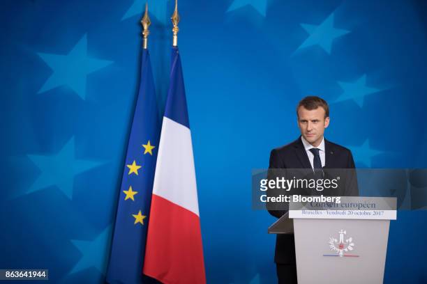 Emmanuel Macron, France's president, pauses during a news conference at a European Union leaders summit in Brussels, Belgium, on Friday, Oct. 20,...