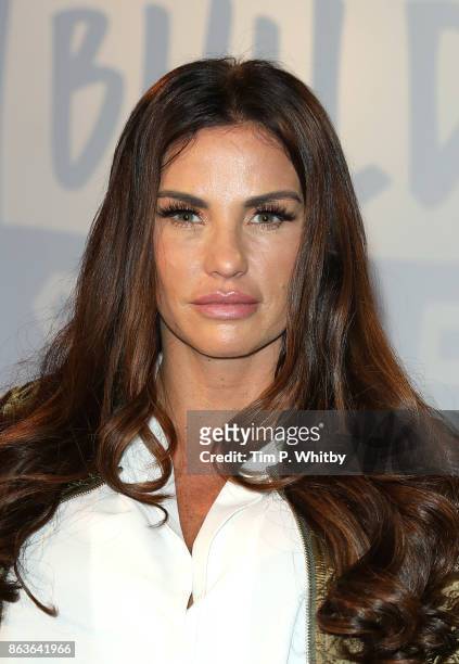Katie Price poses for a photo after a discussion about her new book 'Playing with Fire' and her career at BUILD London on October 20, 2017 in London,...