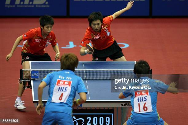 Guo Yue and Li Xiaoxia of China compete in the Women's Doubles final match against Ding Ning and Guo Yan of China during the World Table Tennis...