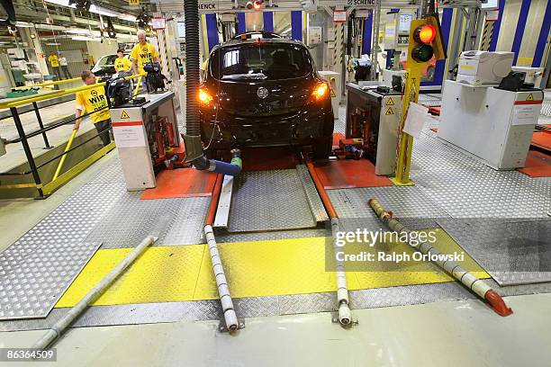 An Opel Corsa stands on a test stand for breaks at a plant on May 4, 2009 in Eisenach, Germany. Representatives of the German government, officials...