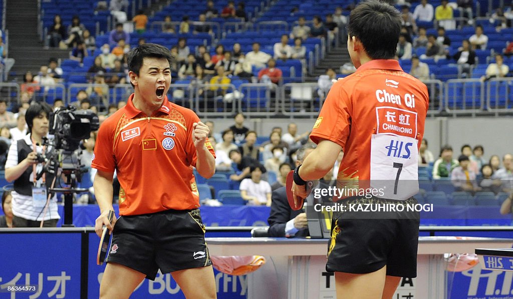 Chinese pair Wang Hao (L) and Chen Qi (#
