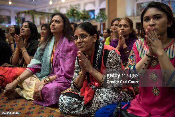 Hindu worshippers take part in a Diwali service led by Guru Mahant Swami Maharaj at Neasden Temple on October 20, 2017 in London, England. BAPS Shri...