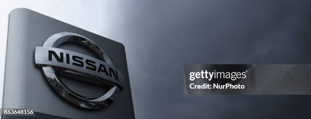 Logo of the Nissan Motor Co. Is displayed in Tokyo, Japan, October 19, 2017. Nissan dips 2% after suspending production in Japan.