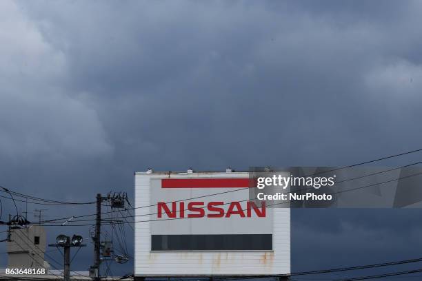 Logo of the Nissan Motor Co. Is displayed in Tokyo, Japan, October 19, 2017. Nissan dips 2% after suspending production in Japan.