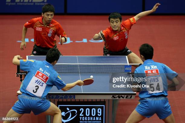 Wang Hao and Chen Qi of China compete in the Men's Doubles final match against Ma Long and Xu Xin of China during the World Table Tennis...