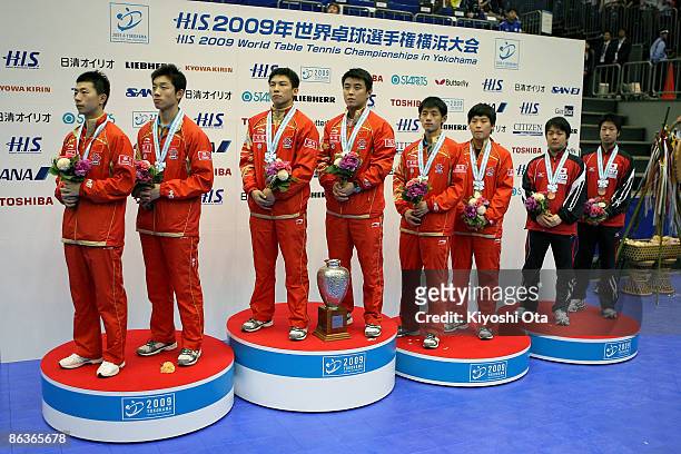 Silver medalists Ma Long and Xu Xin of China, gold medalists Chen Qi and Wang Hao of China, bronze medalists Zhang Jike and Hao Shuai of China and...