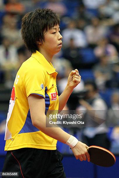 Zhang Yining of China reacts after winning the Women's Singles semi final match against Liu Shiwen of China during the World Table Tennis...