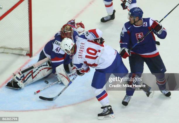 Jaroslav Halak of Slovakia makes a great save to deny Per-Age Skroder of Norway during the IIHF World Championship match between Slovakia and Norway...