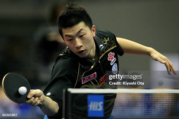 Ma Long of China competes in the Men's Singles semi final match against Wang Hao of China during the World Table Tennis Championships 2009 at...