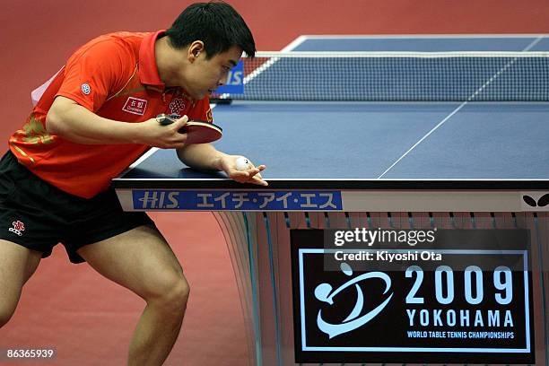 Wang Hao of China serves the ball in the Men's Singles semi final match against Ma Long of China during the World Table Tennis Championships 2009 at...