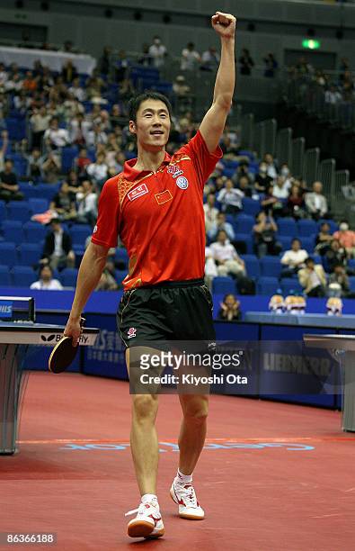 Wang Liqin of China reacts after winning the Men's Singles semi final match against Ma Lin of China during the World Table Tennis Championships 2009...