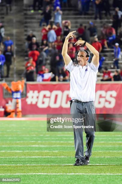 Memphis Tigers head coach Mike Norvell signals his team from the sideline after a second half touchdown during the football game between the Memphis...