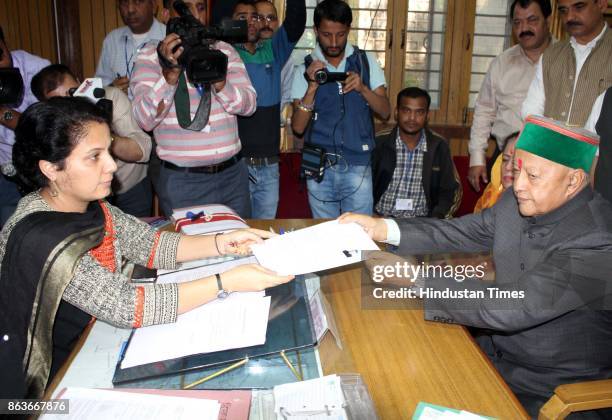 Chief Minister Virbhadra Singh files the nomination papers for Vidhan Sabha elections from Arki constituency, at SDM office, on October 20 2017 in...