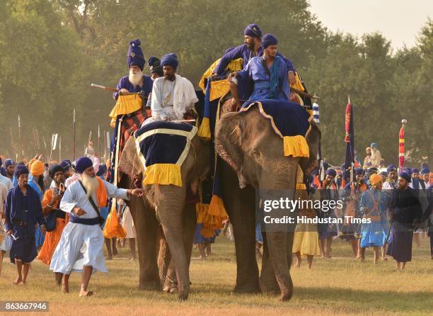 Nihang Singh performs his martial art skills on the occasion of Bandi Chhor Divas, on October 20, 2017 in Amritsar, India. Bandi Chhor Divas is a...