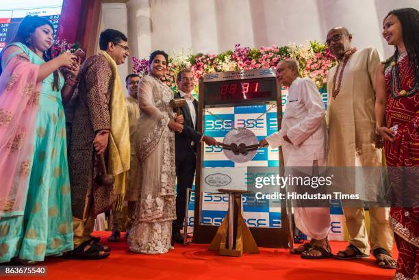 And CEO Ashishkumar Chauhan along with Bollywood actress Richa Chadda during Muhurat trading during Lakshmi Pujan on the occasion of Diwali, at the...