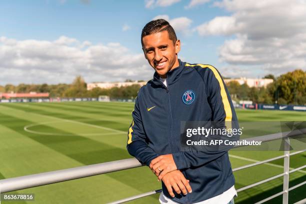 Paris Saint-Germain's Brazilian defender Marcos Marquinhos poses before an interview with an AFP journalist at the Camp des loges, PSG training camp,...