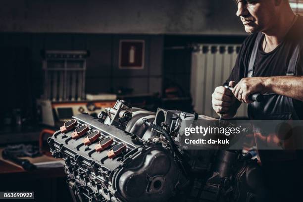 repairing v10 engine in auto repair shop - diesel mechanic stock pictures, royalty-free photos & images