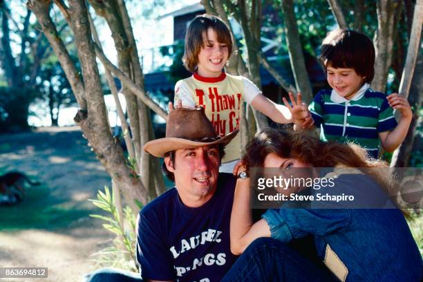 Portrait of American married couple, politician & activist Tom Hayden and actress Jane Fonda, and their children, Vanessa Vadim and Troy Garity, as...