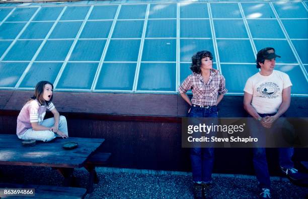 Portrait of American married couple, actress Jane Fonda and politician & activist Tom Hayden , outdoors with their daughter, Vanessa Vadim, Santa...