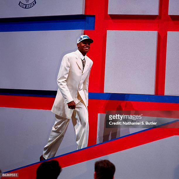 Ray Allen walks up the stage after being selected fifth overall by the Minnesota Timberwolves during the 1996 NBA Draft on June 26, 1996 at the...