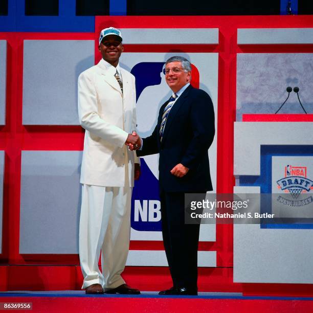 Ray Allen shakes hands with NBA Commissioner David Stern after being selected fifth overall by the Minnesota Timberwolves during the 1996 NBA Draft...