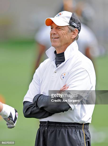 Defensive coordinator Dick LeBeau of the Pittsburgh Steelers watches the defensive line practice during rookie training camp at the Pittsburgh...
