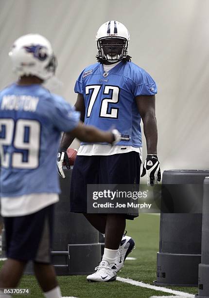 Sen'Derrick Marks of the Tennessee Titans runs drills during the Tennessee Titans Minicamp on May 1, 2009 at Baptist Sports Park in Nashville,...