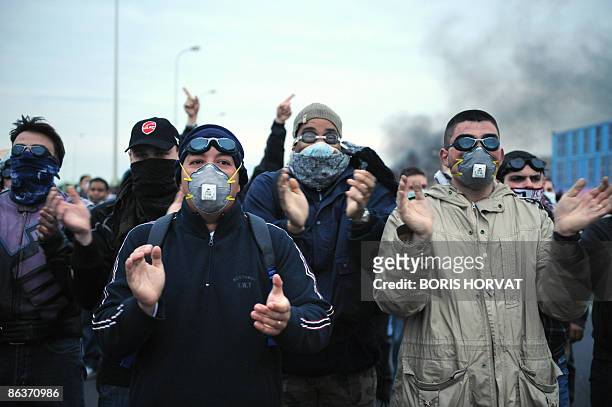 Prison guards demonstrate as they block access to the prison in Fleury-Merogis, outside of Paris, on May 4, 2009 during a national 'progressive...