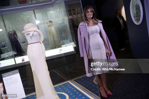 First lady Melania Trump attends an event at the Smithsonian National Museum of American History where the first lady donated her inaugural gown to...