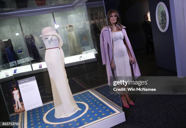 First lady Melania Trump attends an event at the Smithsonian National Museum of American History where the first lady donated her inaugural gown to...