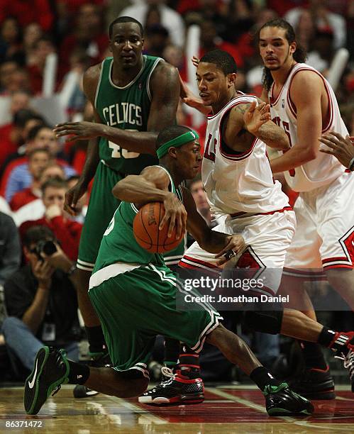 Rajon Rondo of the Boston Celtics moves against Derrick Rose of the Chicago Bulls in Game Six of the Eastern Conference Quarterfinals during the 2009...