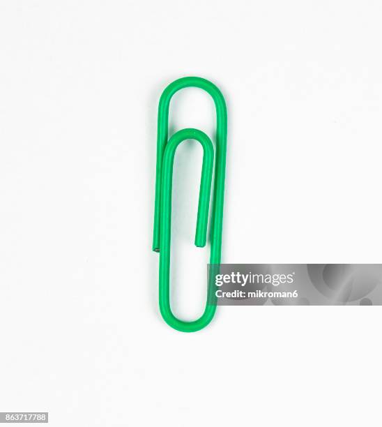 colourful paper clips on white background - ゼムピン ストックフォトと画像