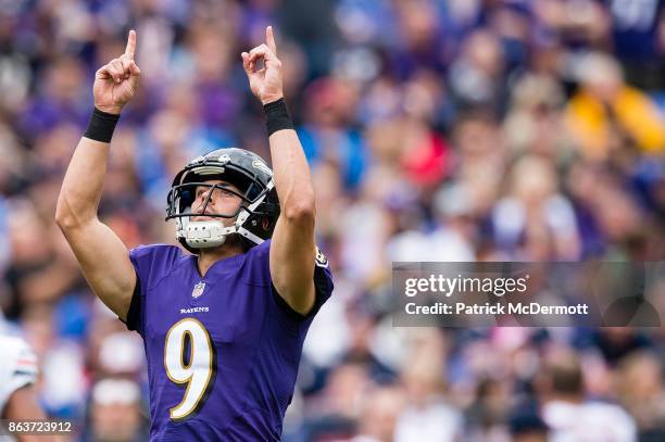 Kicker Justin Tucker of the Baltimore Ravens celebrates after kicking a field goal in the second quarter against the Chicago Bears at M&T Bank...