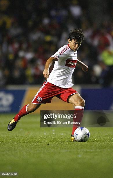 Baggio Husidic of the Chicago Fire passes the ball during the first half against Club America at Toyota Park on April 29, 2009 in Bridgeview,...