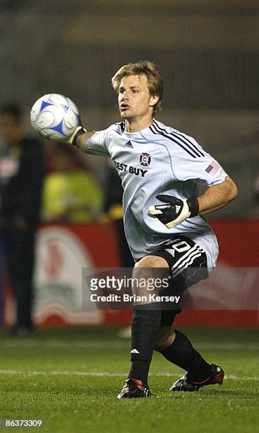 Goalkeeper Andrew Dykstra of the Chicago Fire makes a pass during the second half against Club America at Toyota Park on April 29, 2009 in...