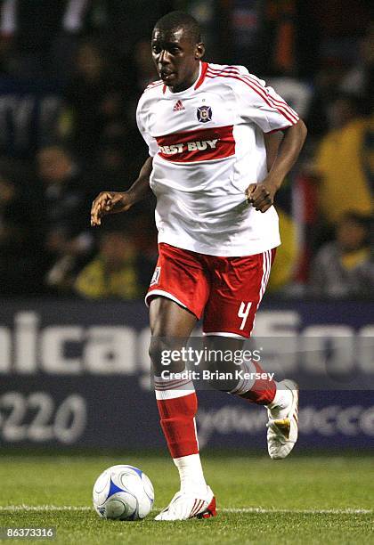 Bakary Soumare of the Chicago Fire moves the ball up the field during the second half against Club America at Toyota Park on April 29, 2009 in...