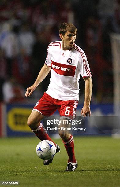 Brandon Prideaux of the Chicago Fire moves the ball up the field during the first half against Club America at Toyota Park on April 29, 2009 in...